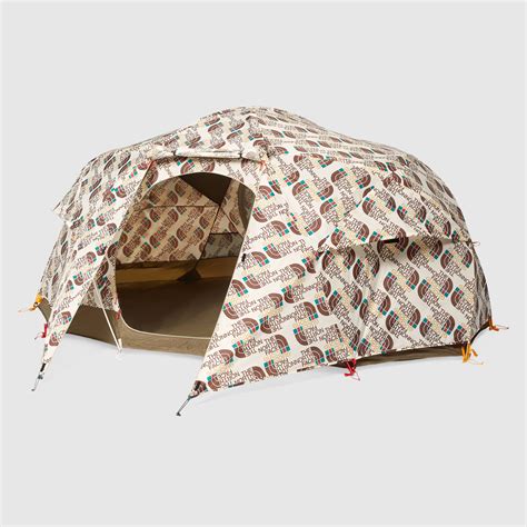 north face x gucci tent.